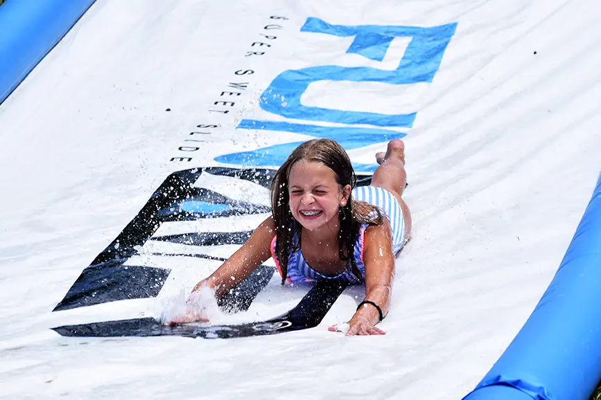 First-Time Camp Parents: What To Expect 2 First-Time Camp Parents: What To Expect - A Summer Camper Enjoying An Activity.