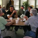 How To Plan A Church Retreat: A Group Of Men At A Men'S Retreat.