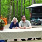 A Happy Christian Couple Relaxing At Wcrc'S Colonial Pines Campground In Williamsburg, Virginia.