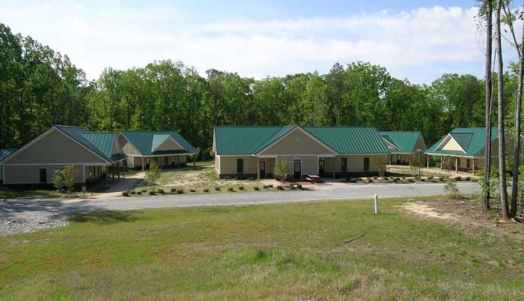 Full Exterior View Of Cabin Village Buildings At Williamsburg Christian Retreat Center In Williamsburg, Virginia