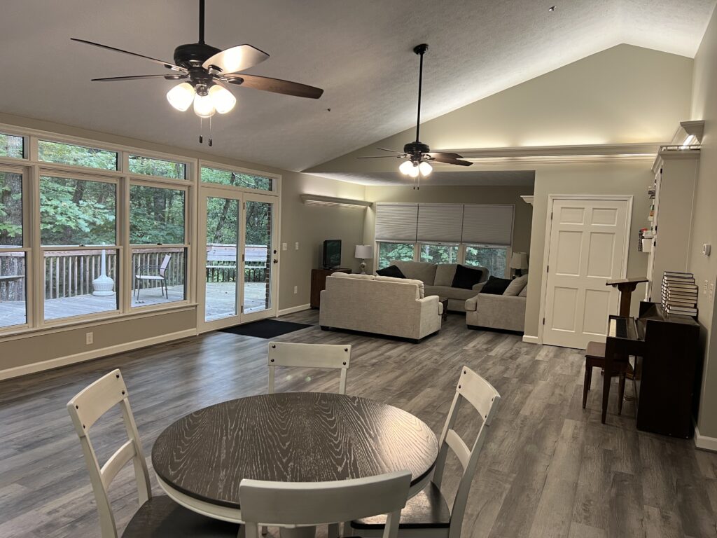 Table and couches showcase comfortable accommodations as one of the most essential retreat center amenities
